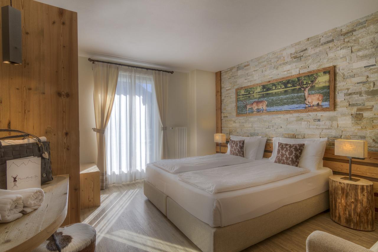 Hotel Madonnina Resort And Wellness Сорага Экстерьер фото